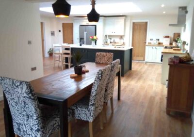 Table and chairs in an open plan bungalow extension in Thrapston