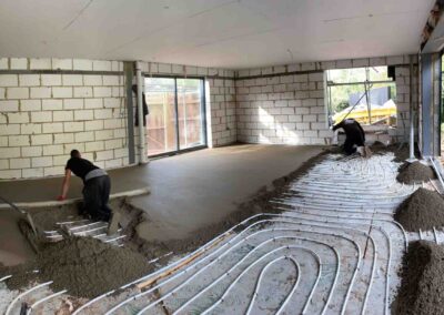 Underfloor heating screed being installed