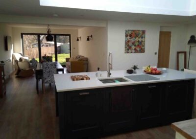 Granite topped kitchen island in an open plan bungalow extension in Thrapston