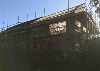 Blockwork complete and roof being installed on double storey extension