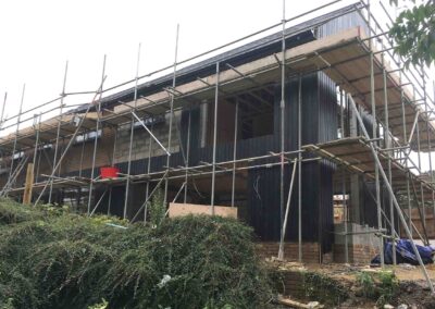 Scaffold around a double storey extension in Titchmarsh