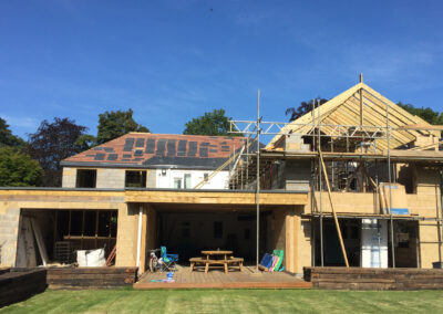 Rear elevation of wraparound extension in Peterborough with partially constructed roof