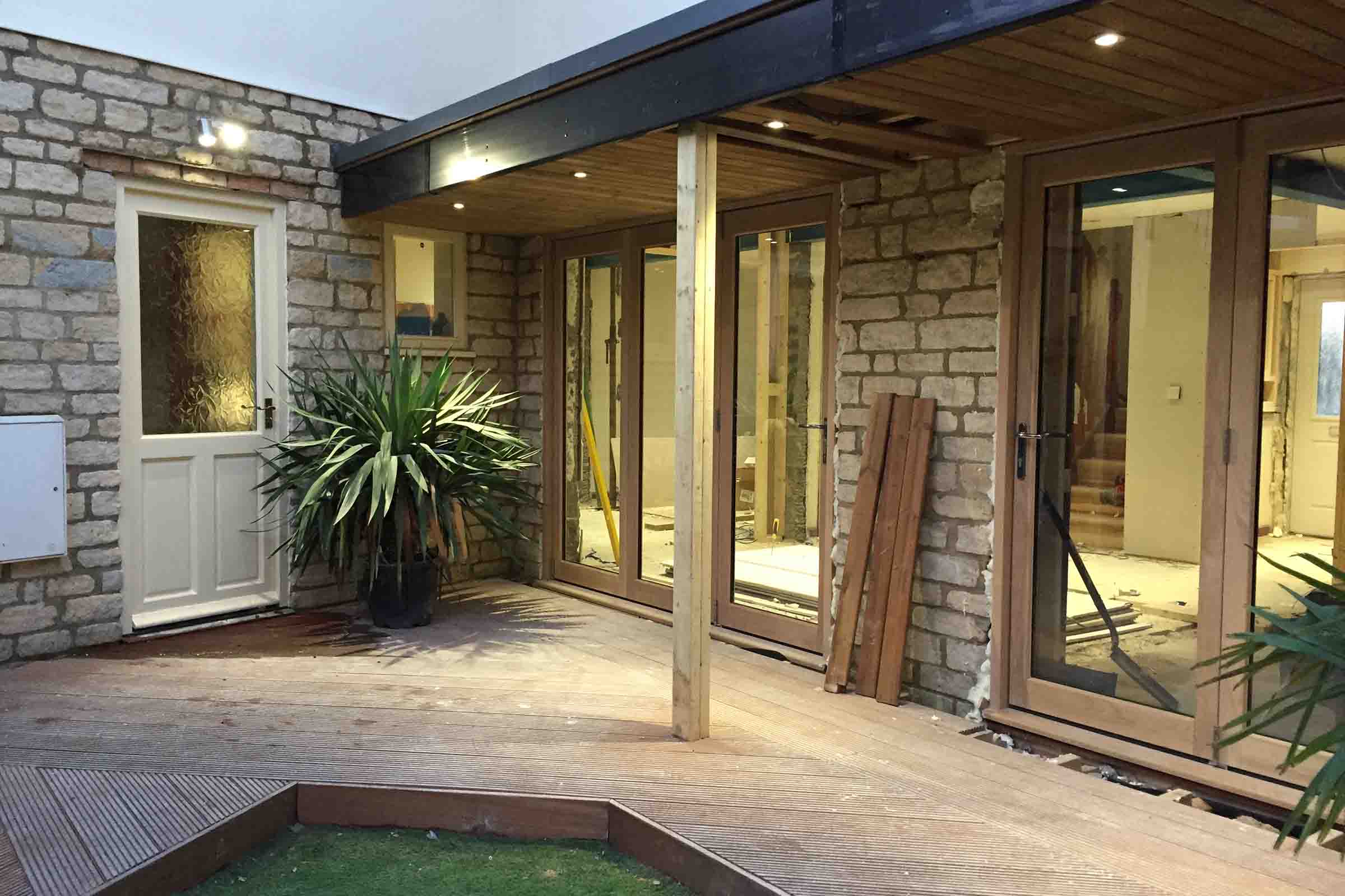 Screed contractor using traditional screed to install underfloor heating at a site in Wellingborough